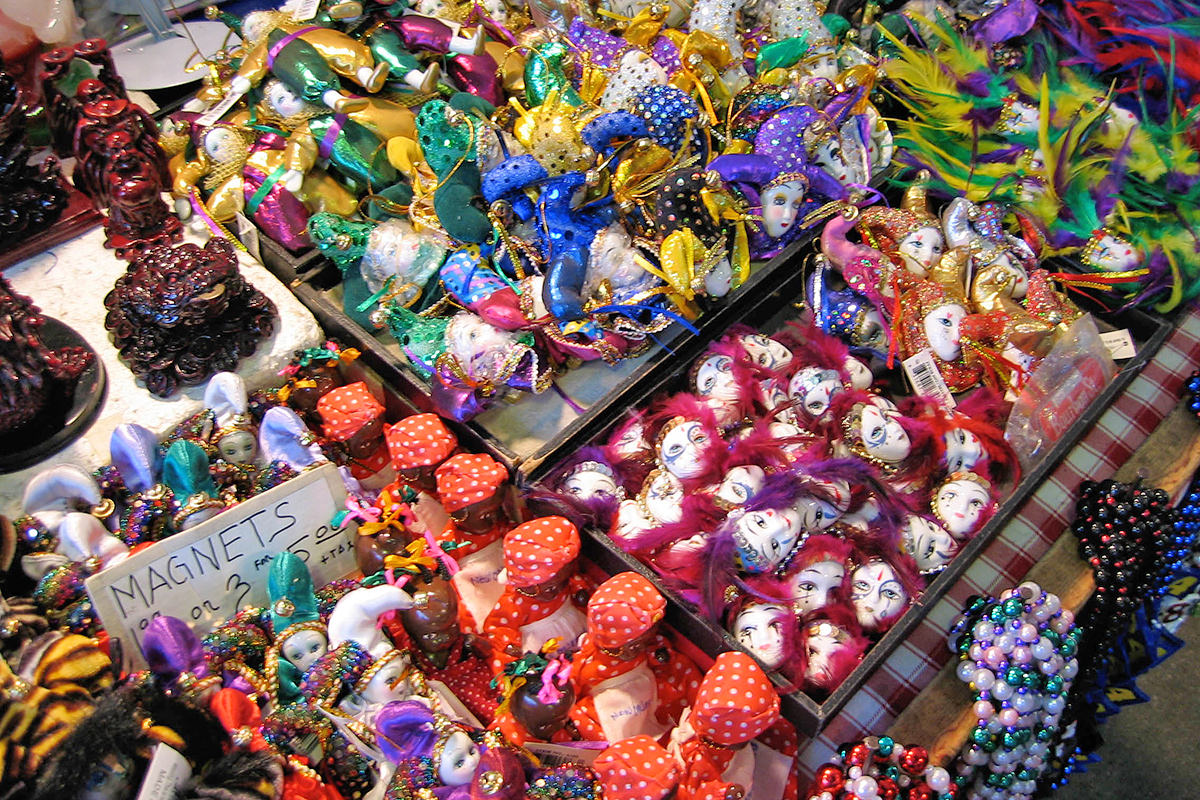 Bins filled with small colorful toys, magnets, figurines, and such.