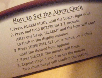 Complicated instruction card for setting an alarm clock.