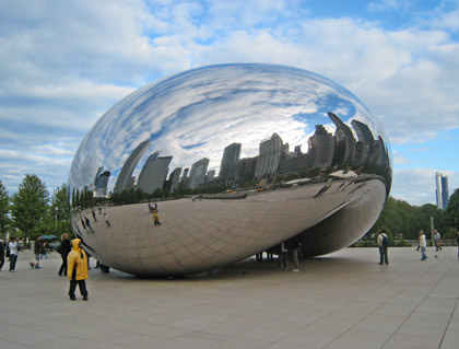 Cloud Gate sculpture... a giant 'coffee bean' shape with a mirrored surface reflecting the Chicago city skyline.