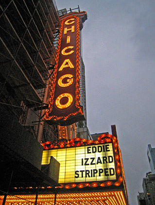 The marquee of the Chicago Theater showing Eddie Izzard Stripped.