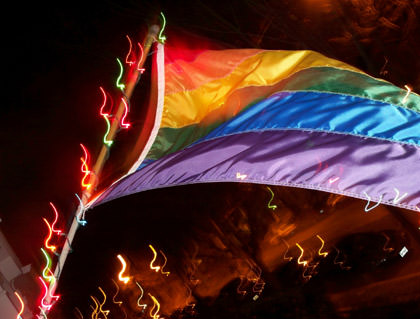 Gay pride flag at night.