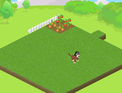 Webkinz monkey playing in a grassy yard next to a garden.