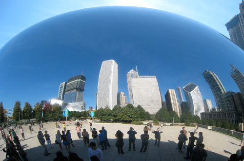 Photo of the Cloudgate sculpture reflecting Chicago skyline