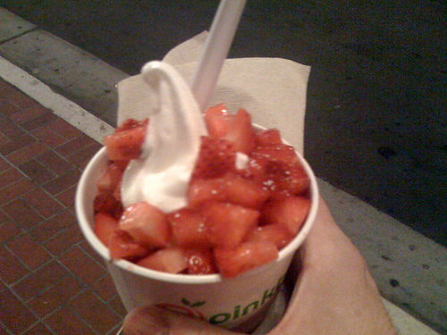 Cup of Pinkberry frozen yogurt with strawberries