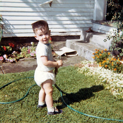 Baby Dave with a Garden Hose