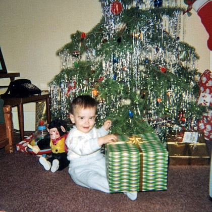 Baby Dave with a Christmas Present