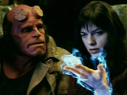 Selma Blair as Liz with fire on her hand in Hellboy