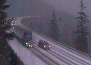 Snow-covered roads over the mountain pass.