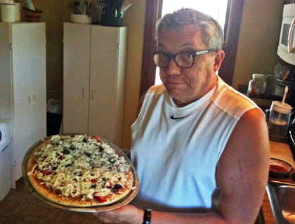 RW shows off his pizza before cooking!