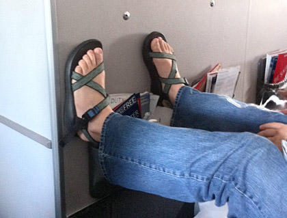 Feet on the Airplane Wall