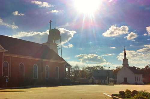 Baptist Church facing Methodist Church at High Noon!