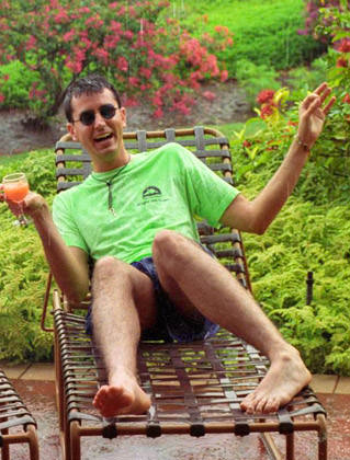 Dave2 getting drunk on POGaritas in the rain in Hawaii.