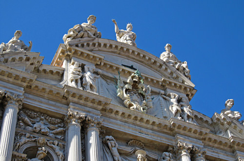 Statues on an old building.