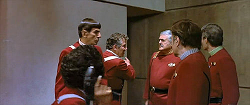 Captain Kirk tells Scotty to check out the back.