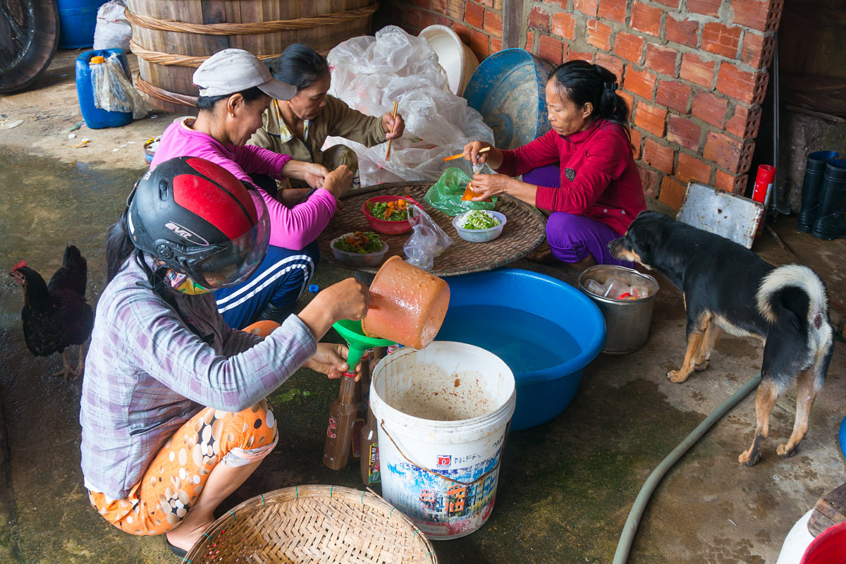 Fish Sauce Workers Having Lunch in Vietnam