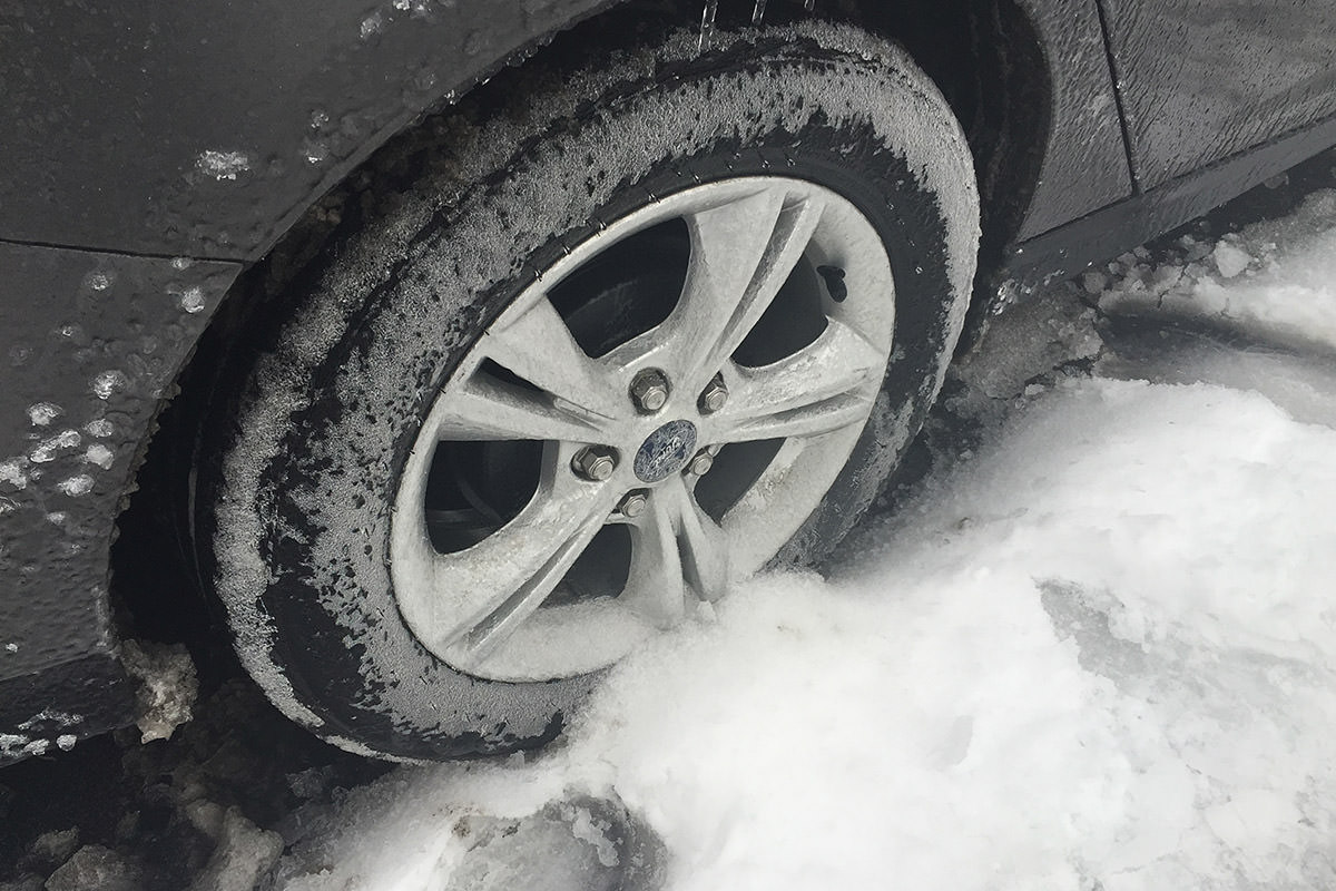 Tires frozen in the snow.