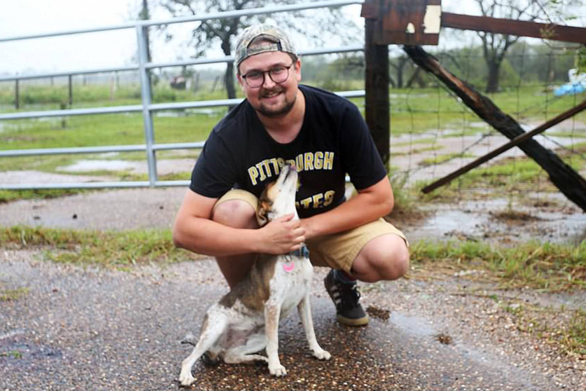 Abandoned Puppy Chained to a Pole in Floodwaters