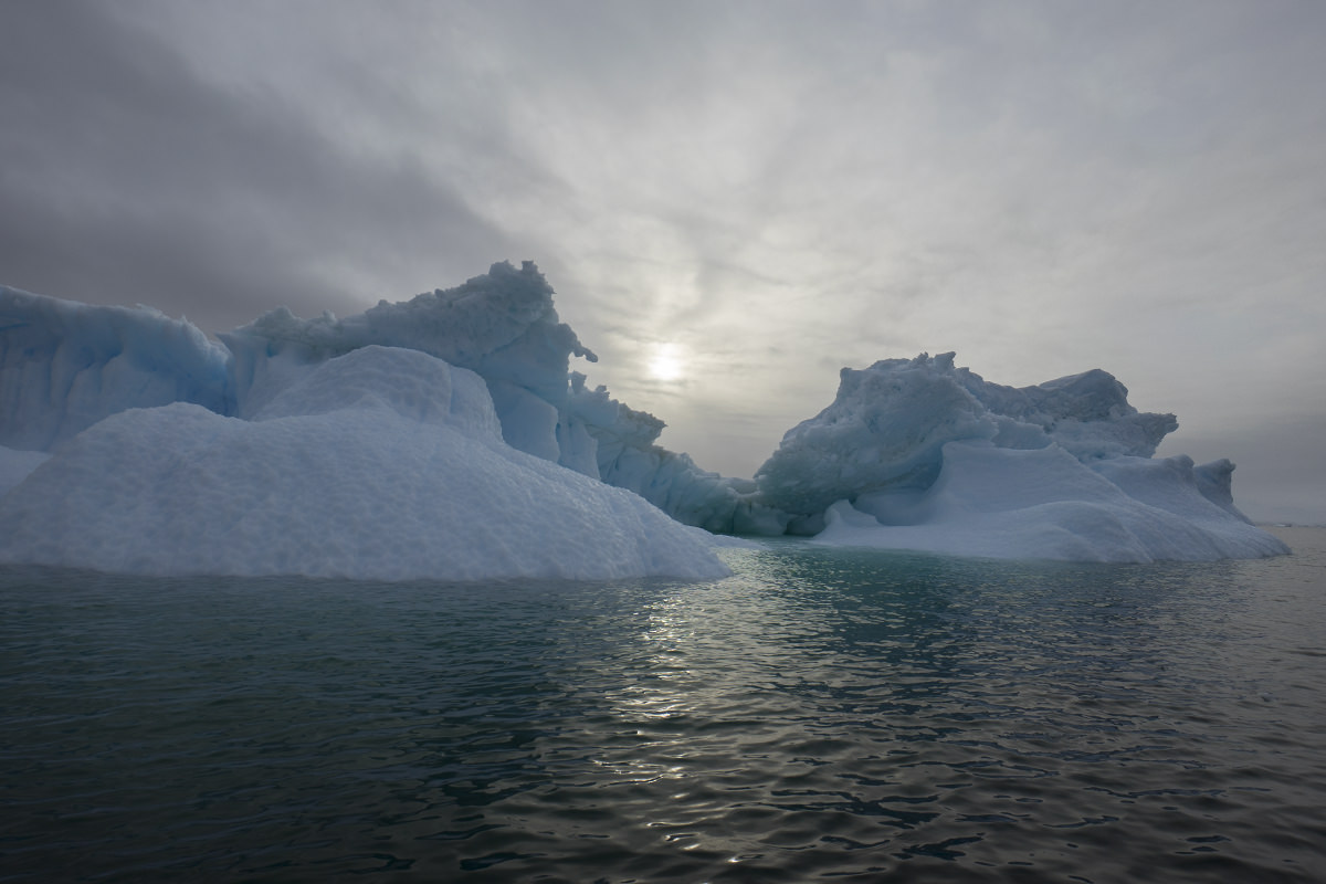 Glaciers floating around at night... WHERE THE SUN IS OUT!