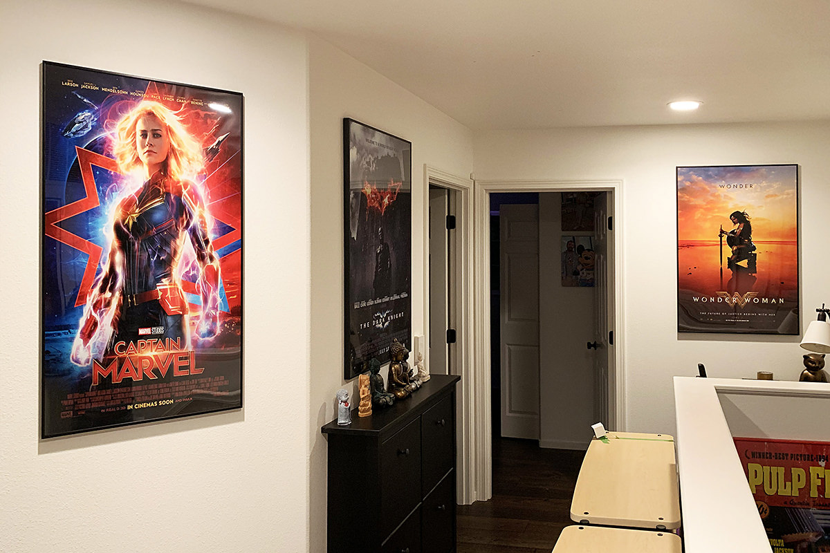 Captain Marvel and Wonder Woman hanging in my hallway