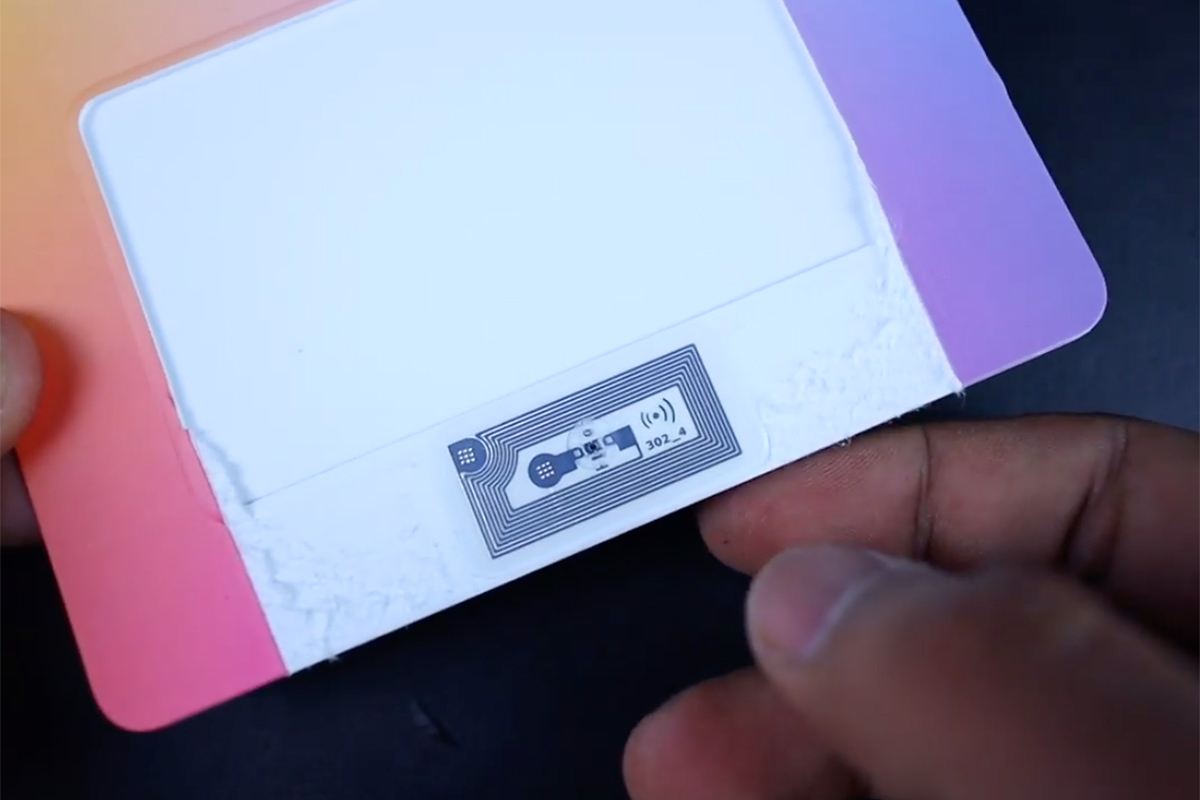 The Apple Card folio cut away to reveal a chip inside.