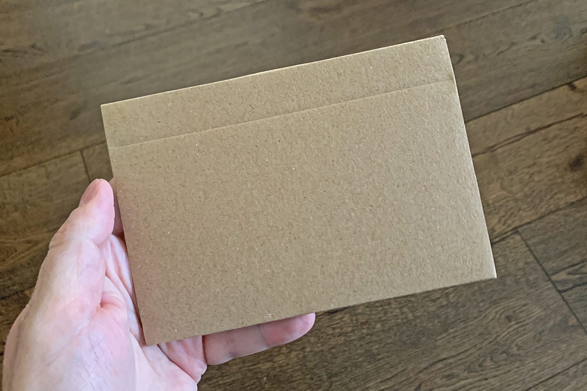 A plain brown kraft envelope.