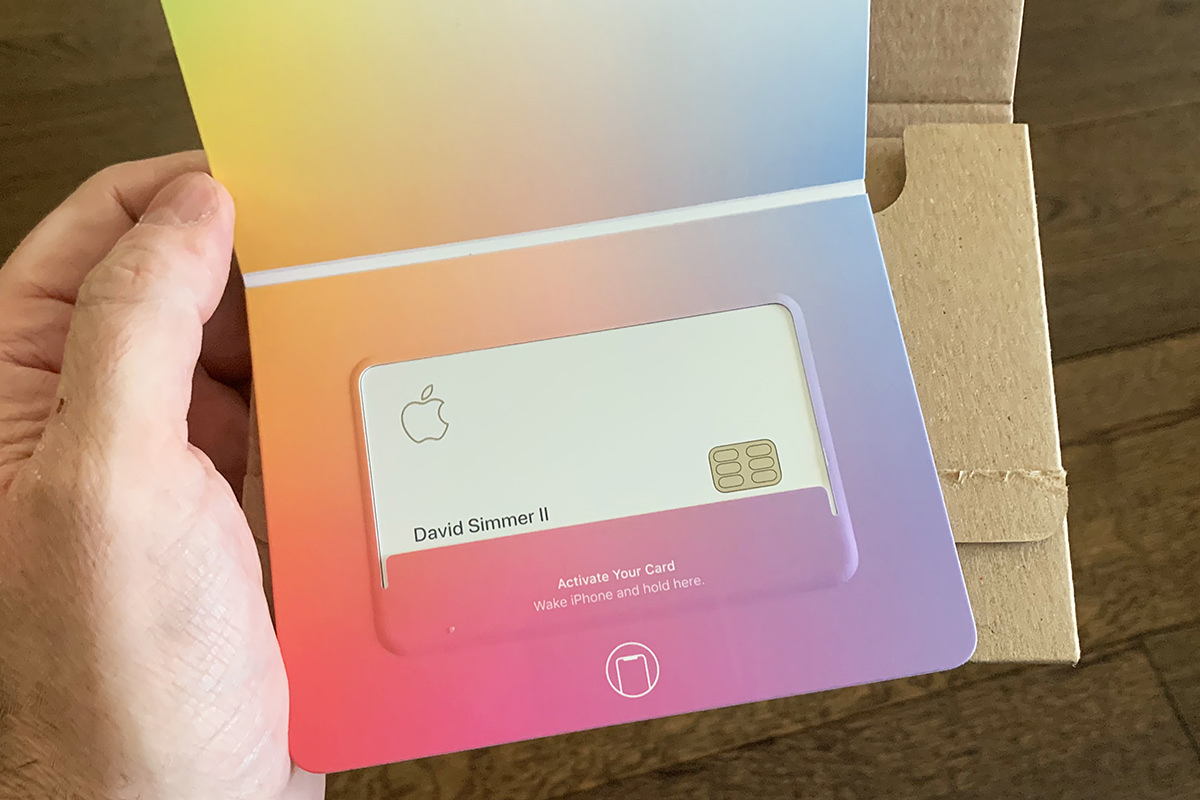 Opening the Apple-embossed folio reveals the Apple card in a holder filled with colors.