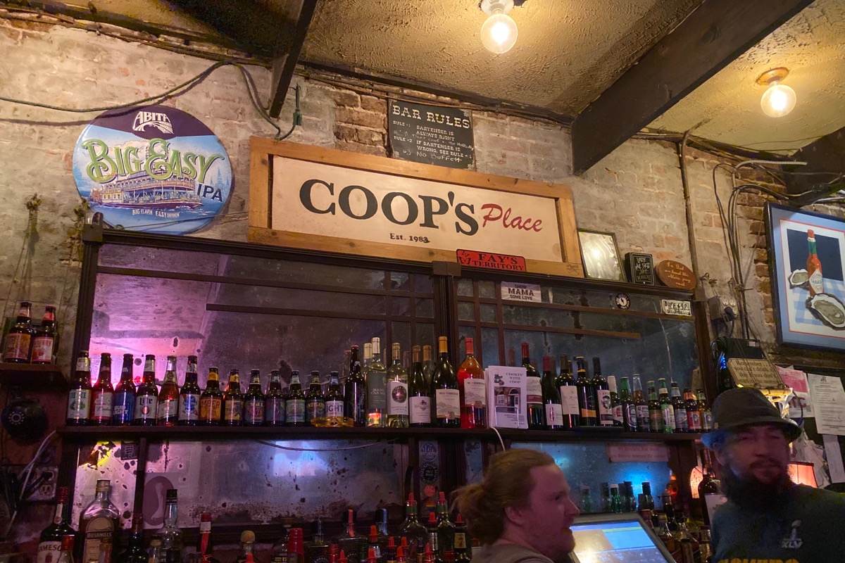 The bar at Coop’s Place, which looks pretty much like every other dive bar you’ve ever seen.