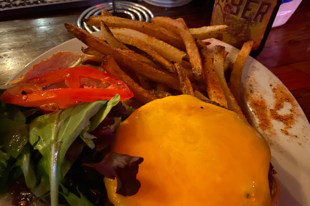 My veggie burger at Coop’s Place... looking delicious next to some HEAVILY seasoned fries.