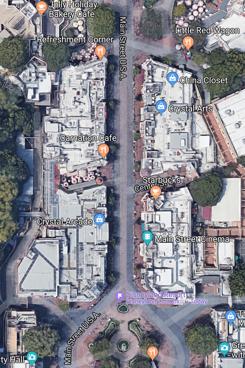 An aerial view of Disneyland's Main Street showing how all the buildings are under two big roofs.