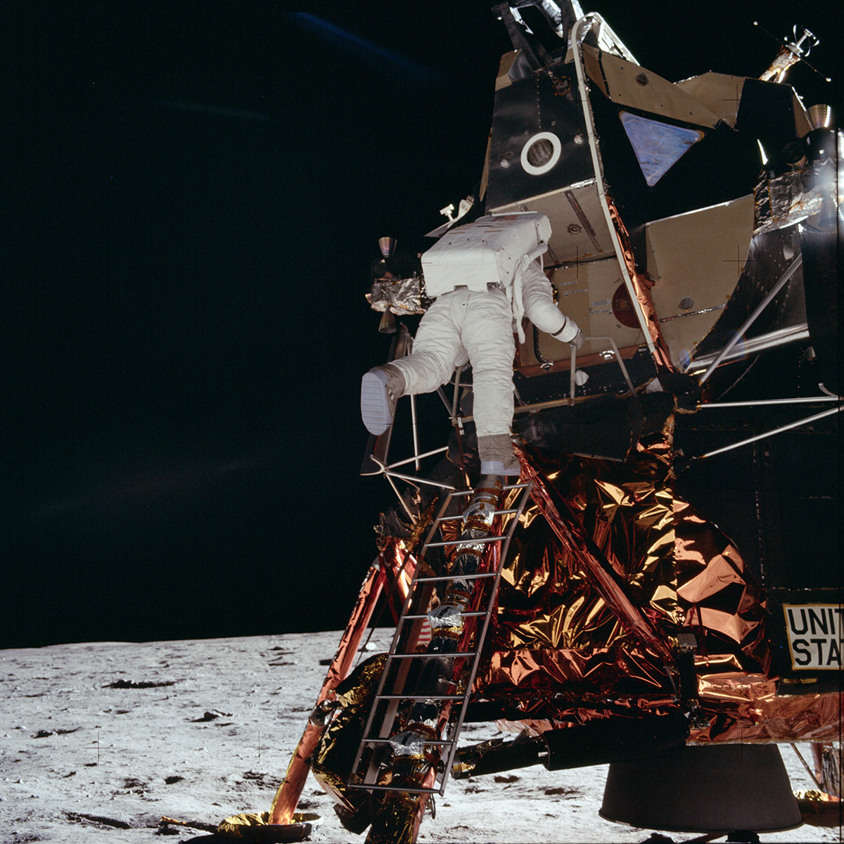 An astronaut descending from the lunar lander on the moon.