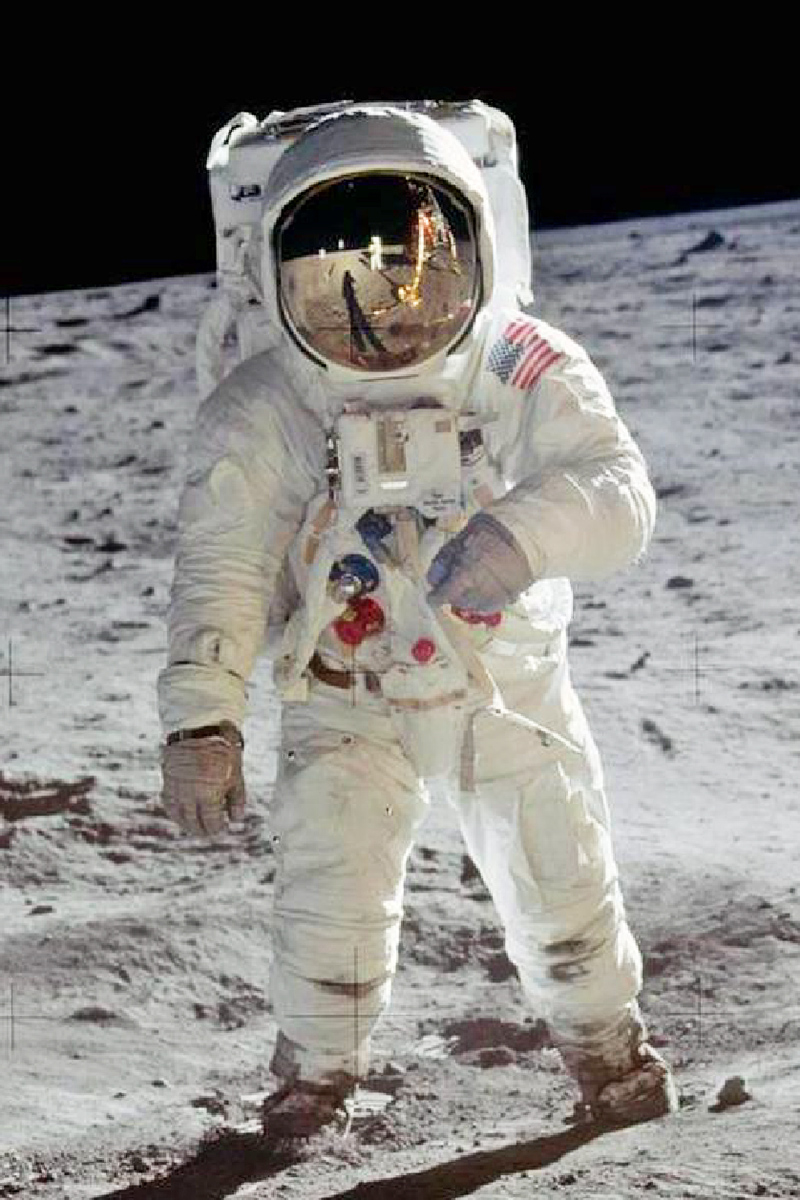 An Apollo astronaut on the moon.