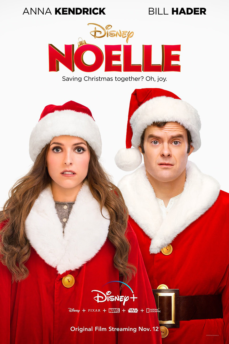 Anna Kendrick and Bill Hader dressed in Santa suits.