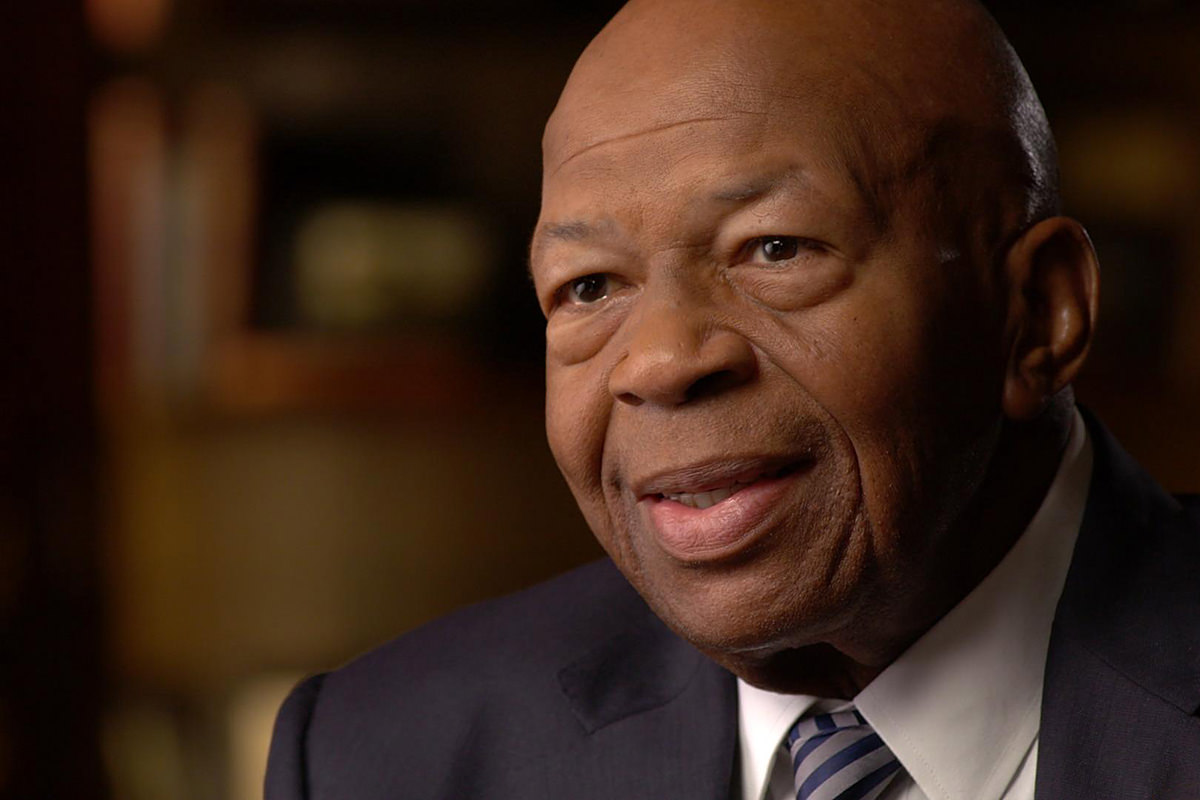 Representative Elijah Cummings looking into the camera and smiling.