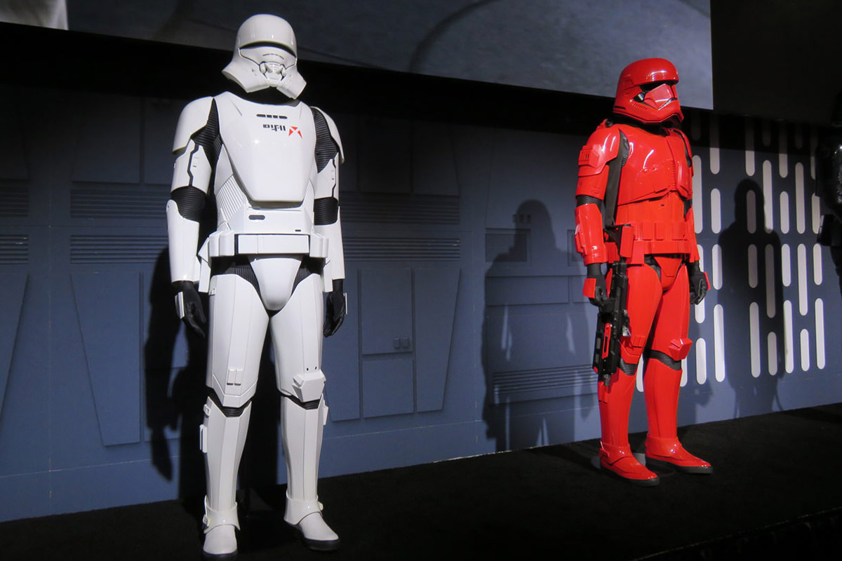 White Jet Trooper and red Sith Trooper armor on display.