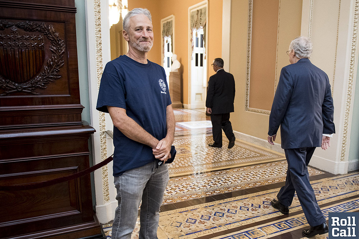 Jon Stewart smiles as Piece of FUCKING SHIT Mitch McConnell walks by