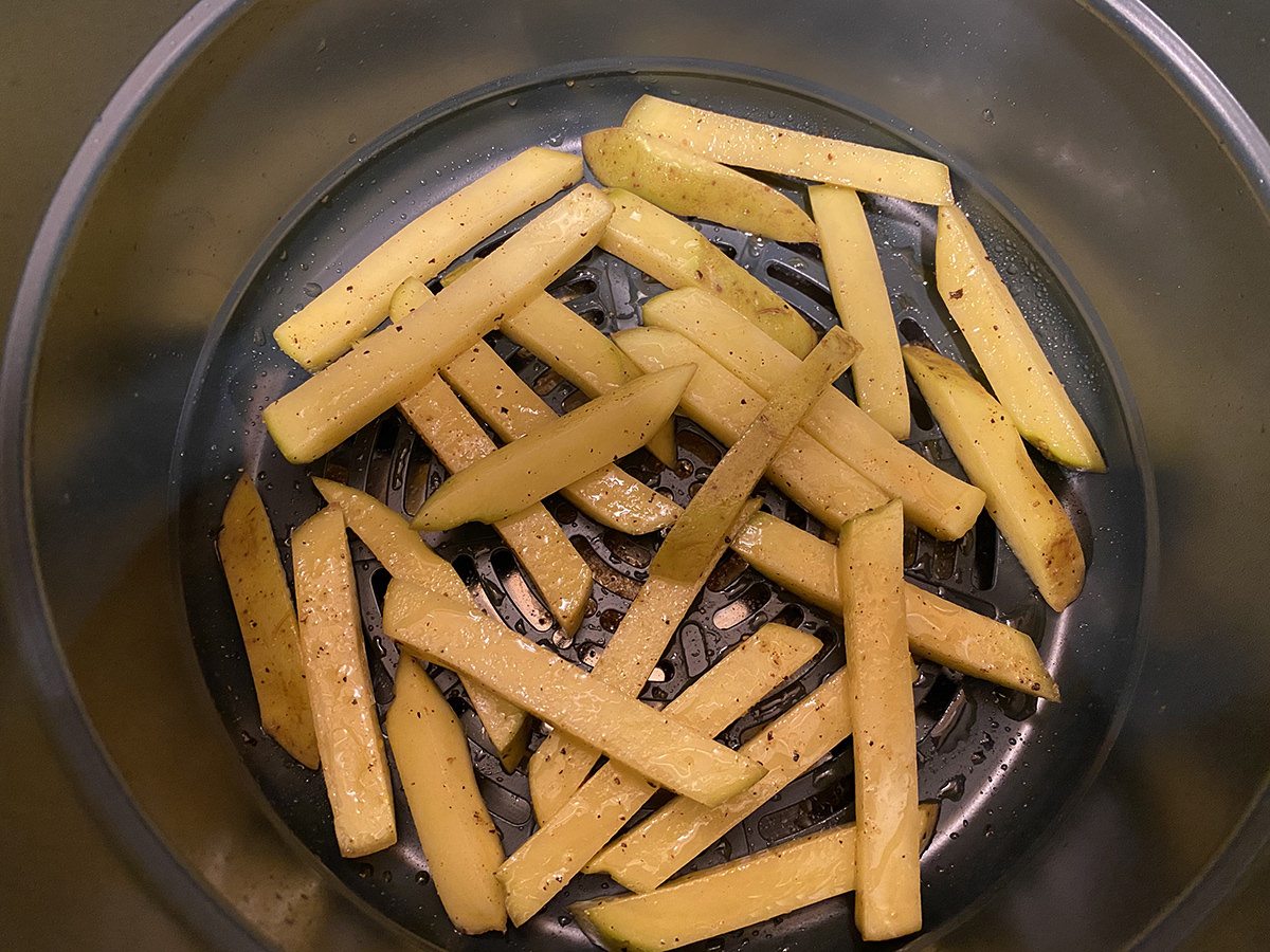 The sliced potatoes transfered to the Instant Pot Duo Crisp.