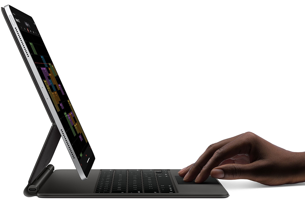 Apple's new Magic Keyboard with an iPad attached to it... when seen from the side everything is really thin.