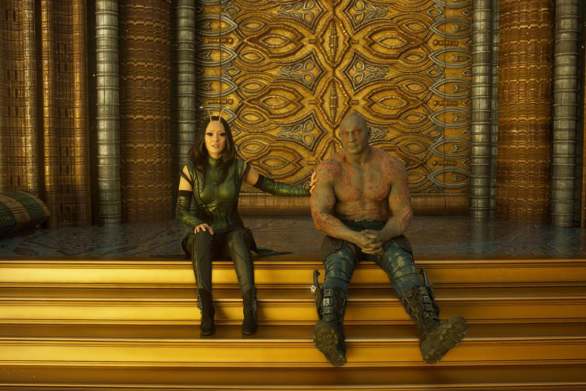 Drax and Mantis sitting on golden steps.