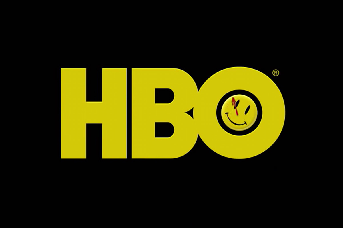 The HBO logo with the Watchmen smiley button that has a happy face with a splotch of blood over the eye.