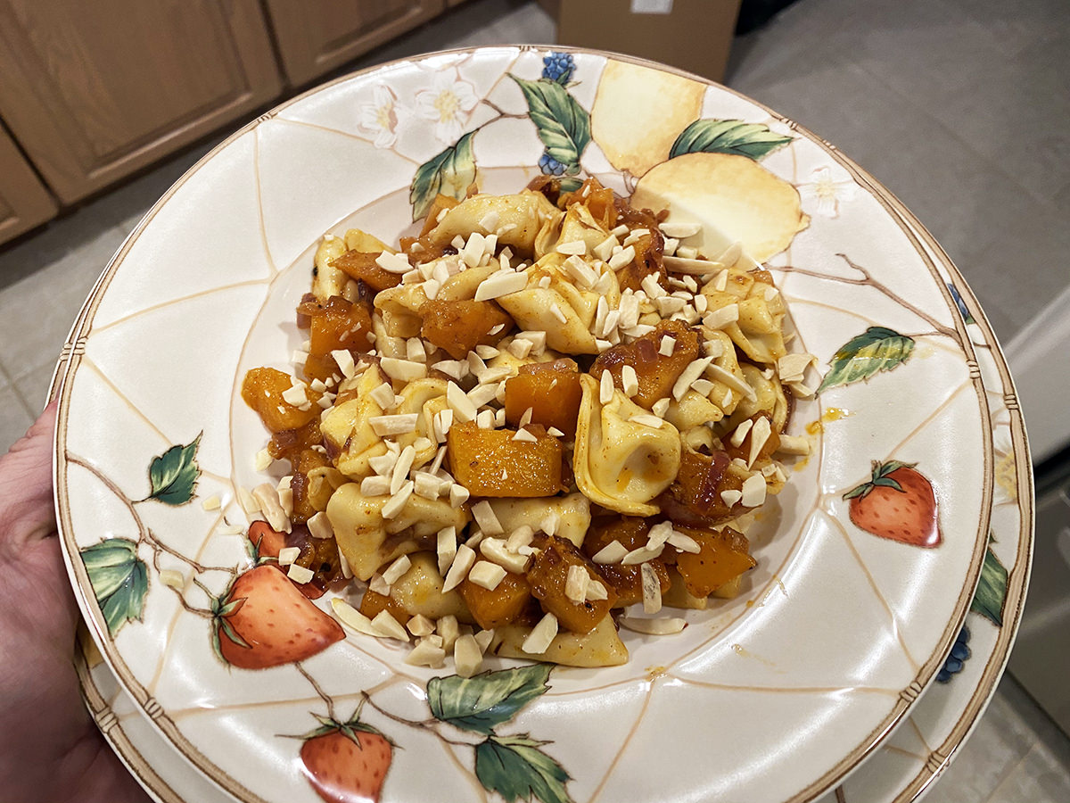 My dinner. It's a bowl of cheese tortelloni with chunks of butternut squash in it.