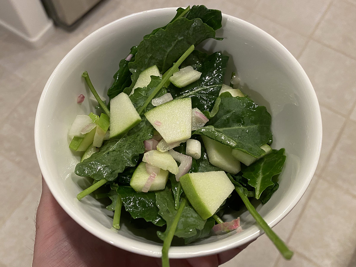 My side salad. A bowl of kale with greasy apple dressing on top.