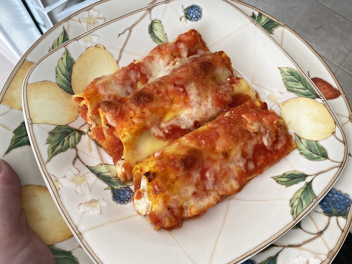 My dinner. It's a plate with cannelloni on it.