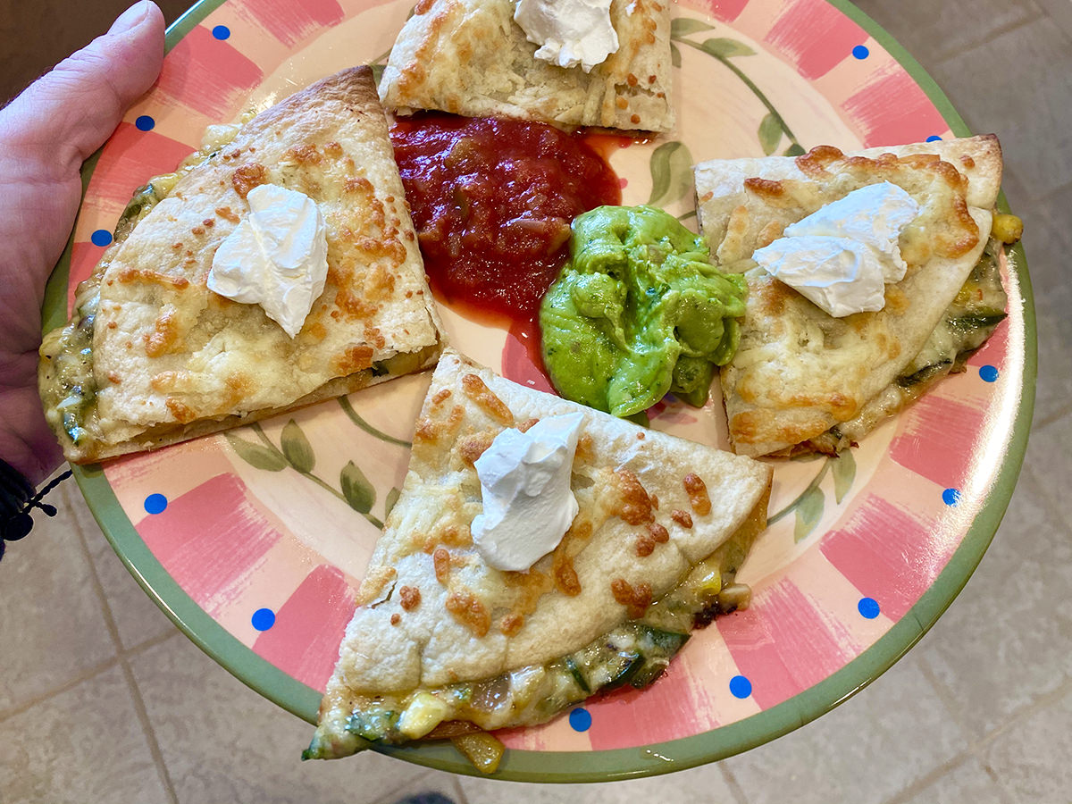 My dinner. It's a plate with my veggie quesadillas on it.