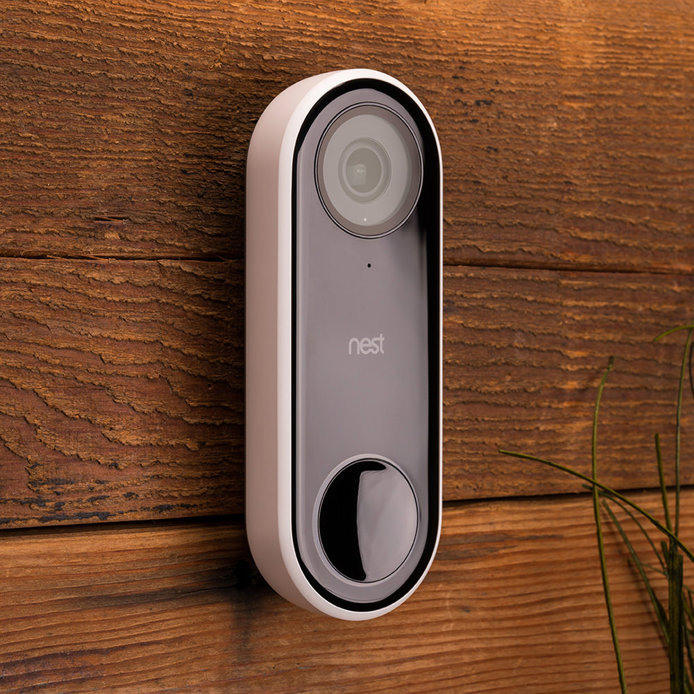 The Nest Hello Smart Doorbell... looks like a small device with a button at the bottom and a camera lens at top.