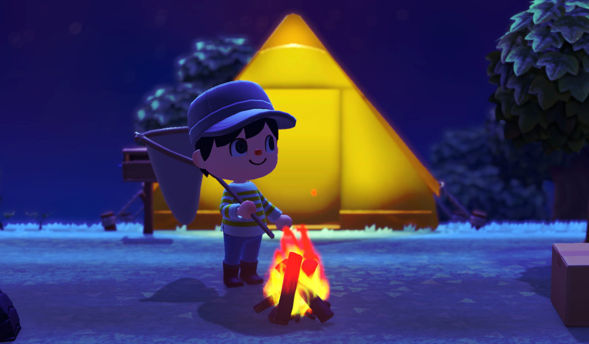 My character sitting by a campfire in front of my tent at night time, but this time the background is gently blurred and it has some atmosphere to it.