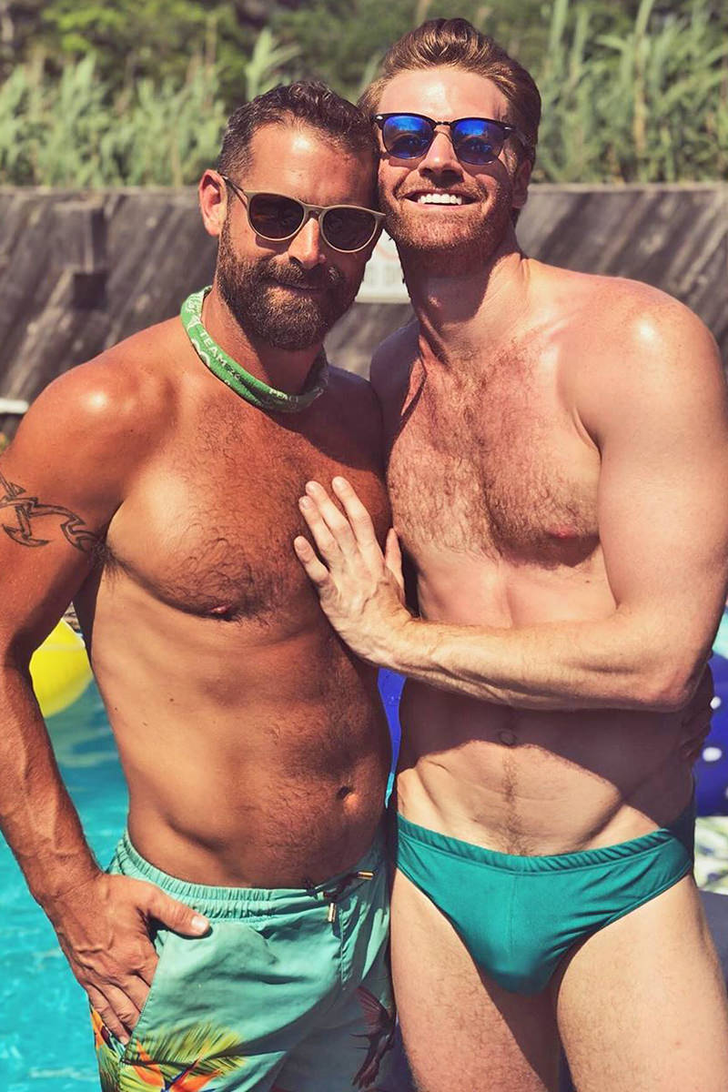 Brian Sims looking gorgeous and hanging out with his dog.