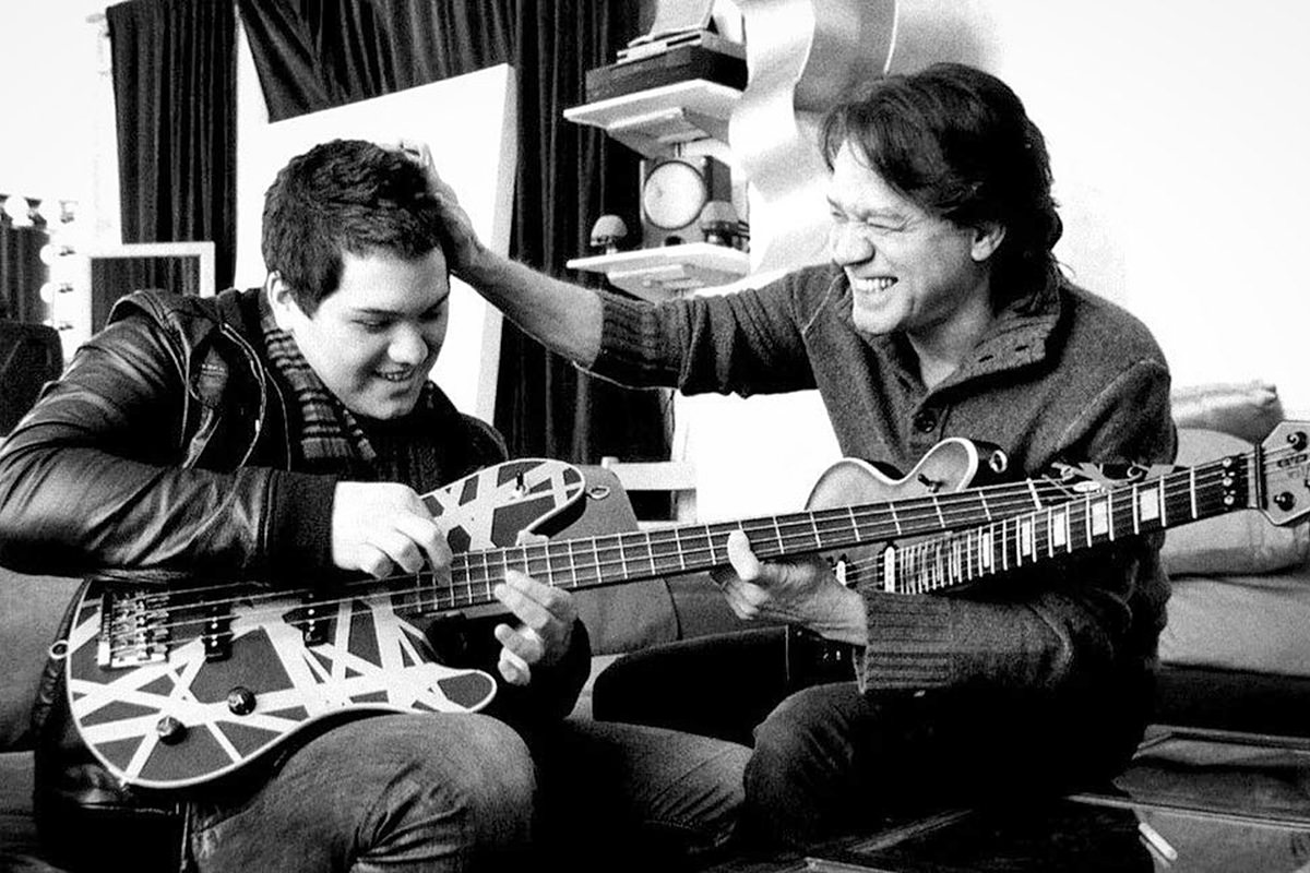 Eddie Van Halen playing guitar with his son Wolfgang Van Halen