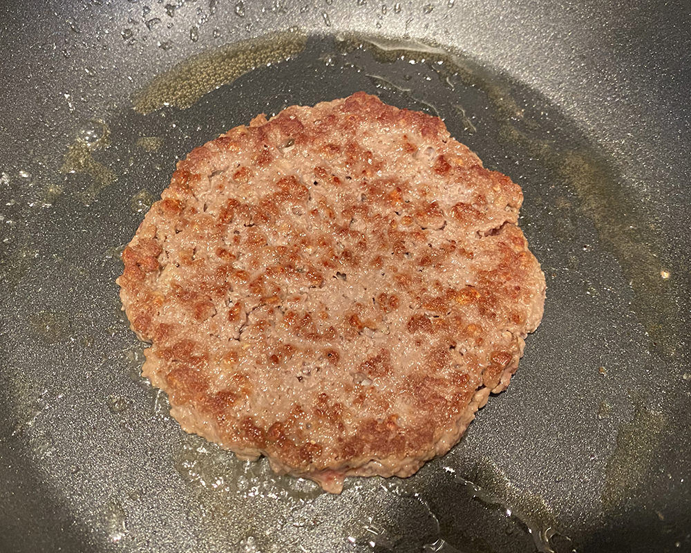 A cooked Impossible Burger in my Skillet.