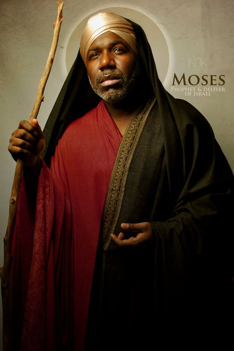 Apostle Moses with a halo behind his head, holding a wooden branch as a staff as photographed by James Lewis..