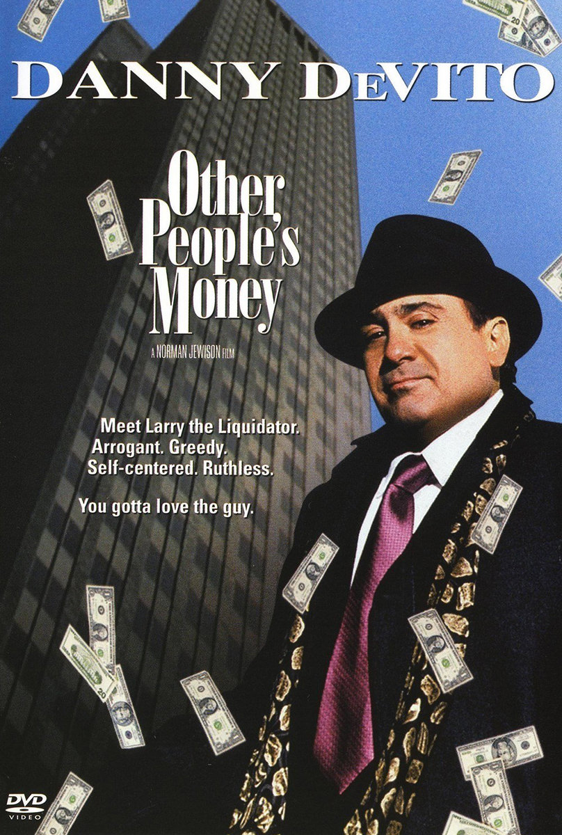 The movie poster for Other People's Money with Danny DeVito being showered with money as he stands in a suit and tie with a Wall St. Building behind him.